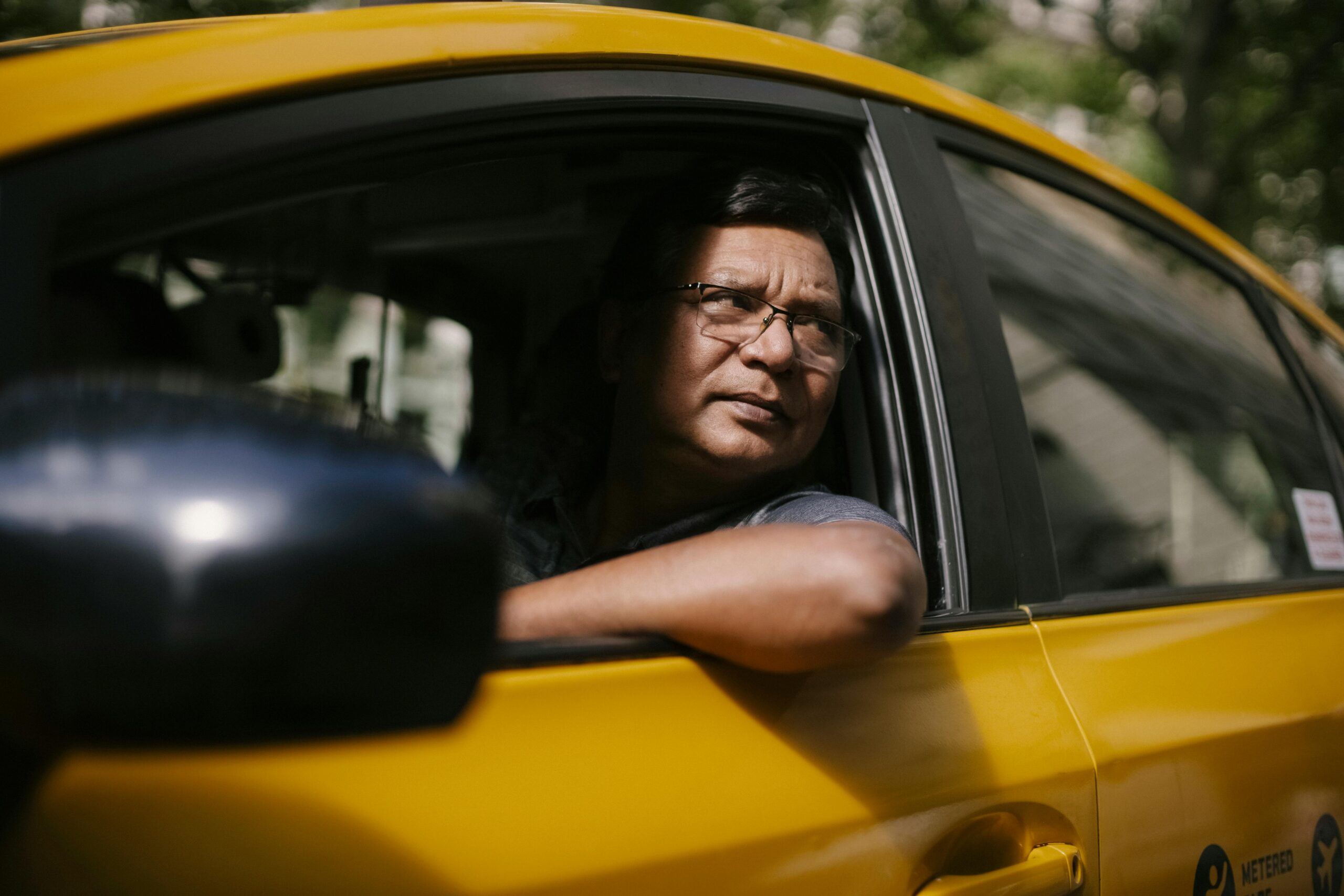 A taxi driver gazes